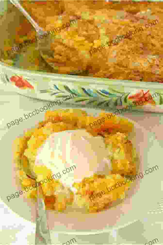 A Golden Brown Peach Cobbler, Bubbling And Fragrant, Served With A Scoop Of Vanilla Ice Cream The Peach Truck Cookbook: 100 Delicious Recipes For All Things Peach