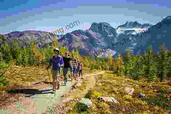 A Group Of Hikers Scrambling Up A Rocky Slope In The Canadian Rockies Scrambles In The Canadian Rockies