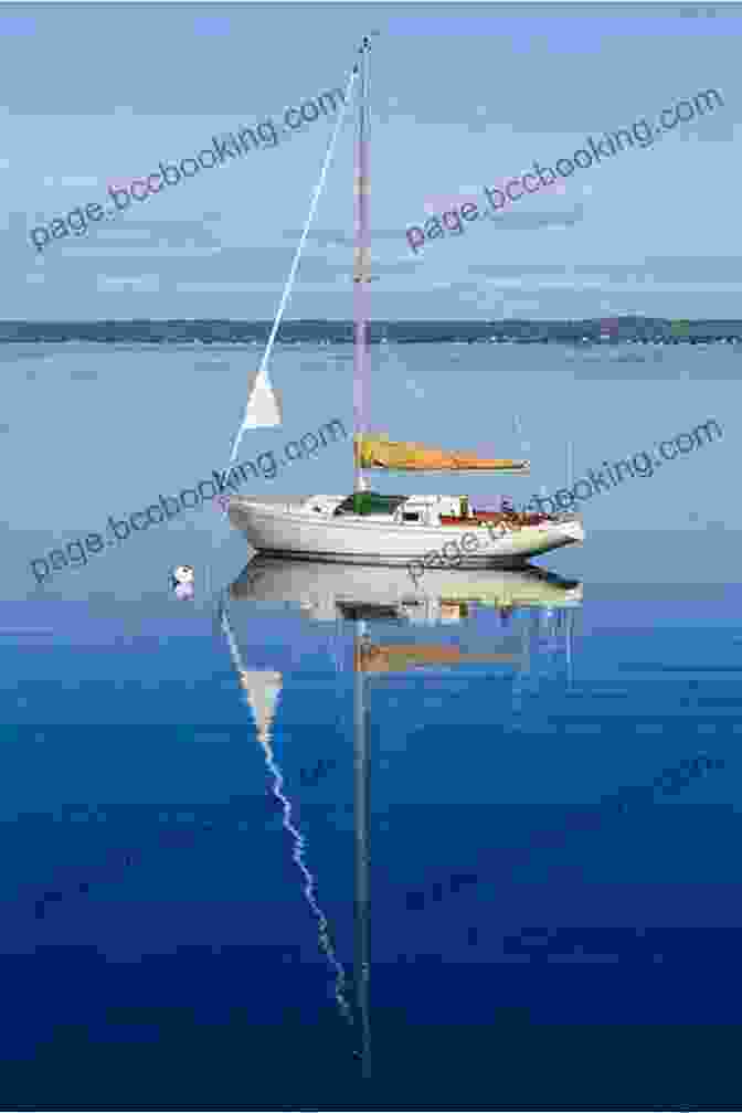 A Sailboat Anchored In A Secluded Cove With Calm Waters Cruising The Chesapeake: A Gunkholers Guide 4th Edition: A Gunkholer S Guide
