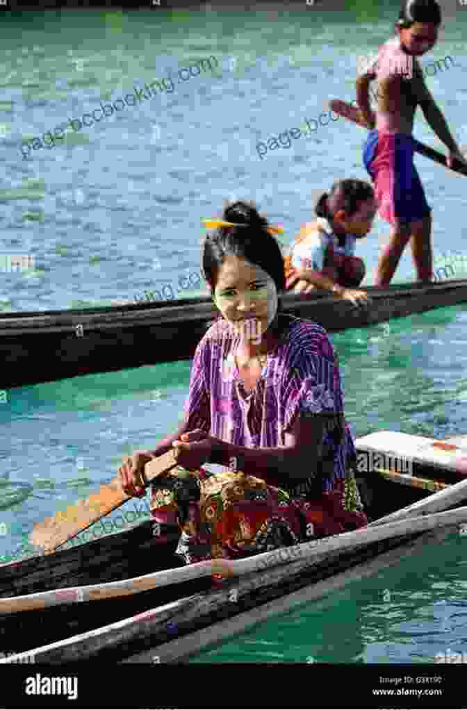 A Woman Paddling A Boat Down A River In Borneo Shooting The Boh: A Woman S Voyage Down The Wildest River In Borneo (Vintage Departures)
