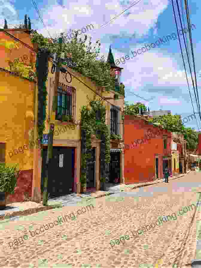 An Artist Paints In The Vibrant Streets Of San Miguel De Allende San Miguel De Allende: A Place In The Heart