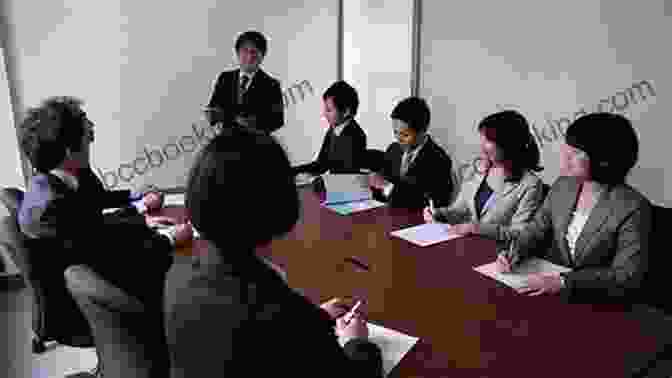 Japanese Business People Having A Meeting In A Boardroom Bridges To Japanese Business Etiquette Understanding Japan Cross Cultural Management