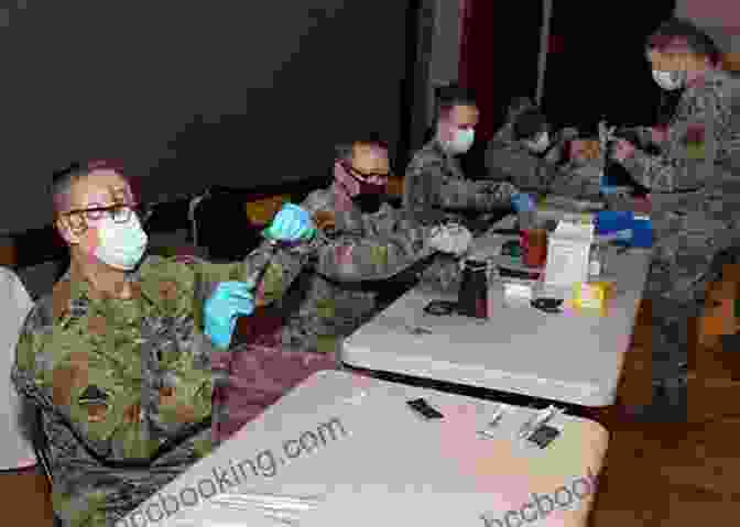 Military Personnel Receiving First Aid Training In Extreme Environment Survival First Aid (Extreme Survival In The Military)