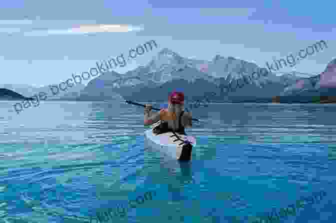 Person Kayaking On A Calm Lake With A Mountain Backdrop Moon Michigan: Lakeside Getaways Scenic Drives Outdoor Recreation (Travel Guide)