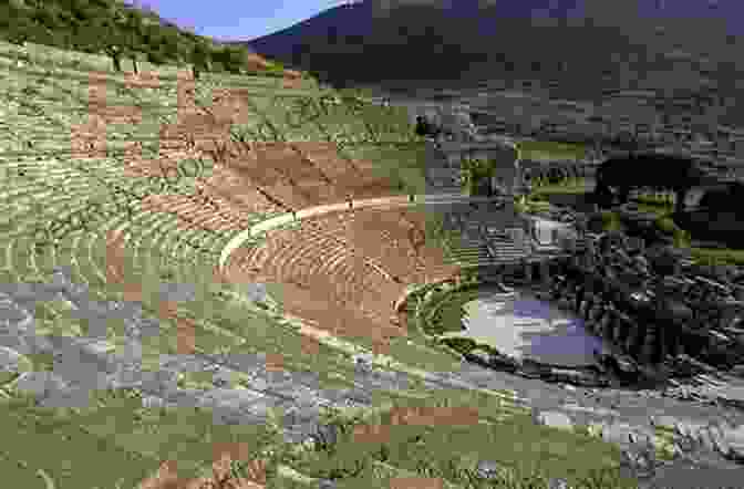 The Ruins Of The Amphitheatre In Ancient Sparta, With Mountains In The Background Mani: Travels In The Southern Peloponnese